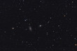 Galaxy Trio in Draco constellation with stars background.