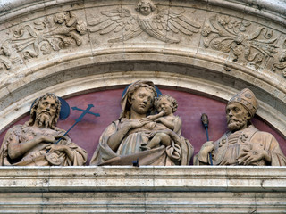 Madonna and Child on one of the portals in Montepulciano