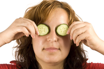 woman and cucumber