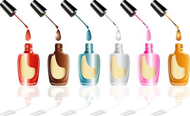 Nail polish in different colors in glass bottles