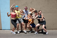 Runners Pose For Muscle Shot