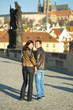 © Evgeniya Uvarova - Young couple on the Charles Bridge