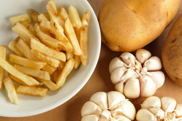 Canvas Print - french fries with potato and garlic