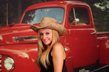 Country Girl In Front Of An Old Pickup Truck