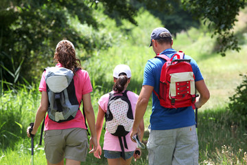 family hiking in the countryside