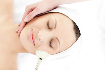 Canvas Print - Cute young woman enjoying a beauty treatment