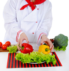 Chef prepares fresh herbs