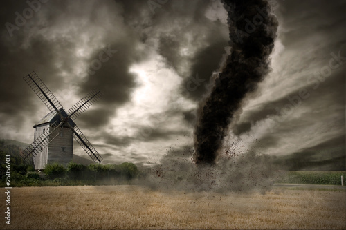 Fotomural Zoom of a large tornado over a wind mill