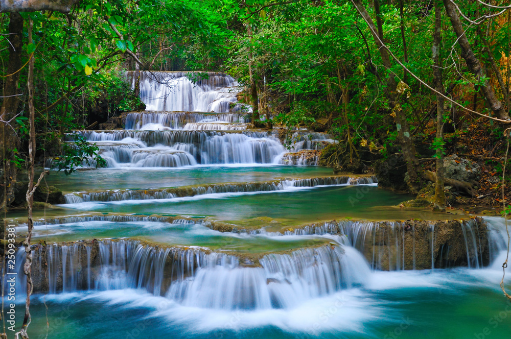 Deep forest Waterfall in Kanchanaburi, Thailand - obrazy, fototapety, plakaty 