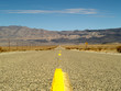 Desert road through Death Valley National Park, California