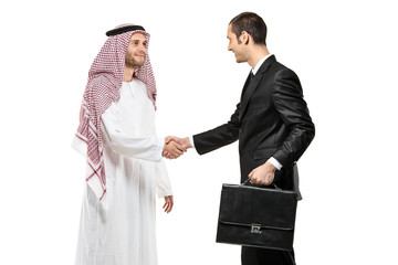 Poster - An Arab person shaking hands with a businessman