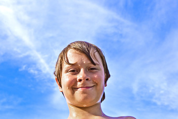 boy enjoys the clear water in the ocean