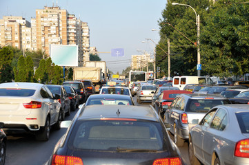 view of a traffic jam at rush hour in european town