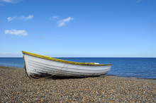 Rowboat On The Beach