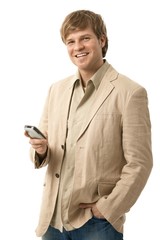 Poster - Happy young man using mobile