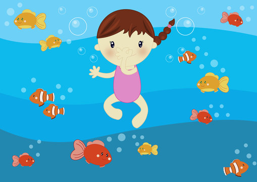 bmabina nuota sott'acqua al mare