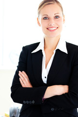 Canvas Print - Confident young businesswoman looking at the camera