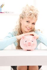 Wall Mural - lovely woman with piggy bank