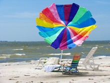 Colorful Beach Umbrella And Chairs