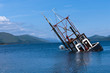 Partially submerged fishing vessel in Loch Linnie