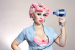 Unhappy housewife with hairdryer