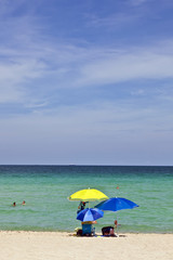 umbrella at the beautiful beach for sun protection