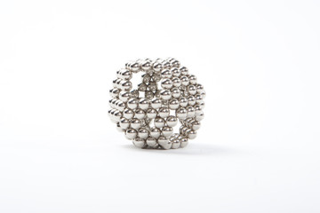 magnetic metal spheres on the white background