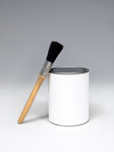 Brush With Black Bristles Near The Paint Pot