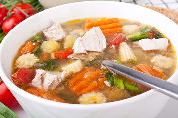 Wall Mural - serving of chicken and vegetable soup