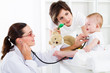 paediatrician checking baby
