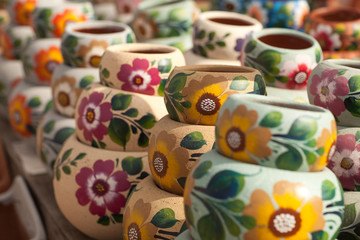 Variety of Colorfully Painted Ceramic Pots.