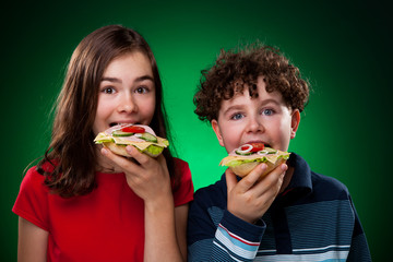 Wall Mural - Kids eating big sandwich