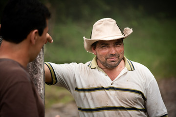 Handsome male ranch hands in Costa Rica