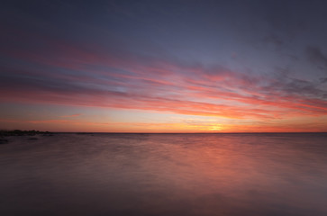  The last light of the day puts color on the clouds.