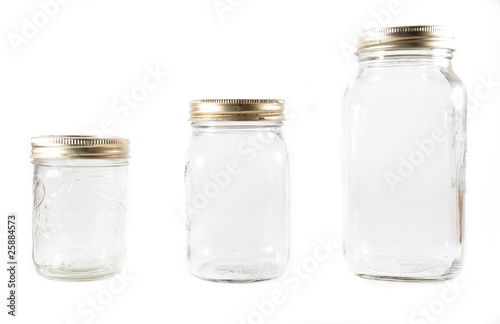 Fotografía Three glass mason jars on an isolated background