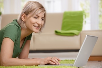 Canvas Print - Happy woman with laptop