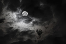 Spooky Full Moon And Eerie White Clouds