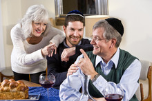 Mid-adult Jewish Man At Home With Senior Parents