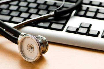 Stethoscope and keyboard illustrating concept of digital securit