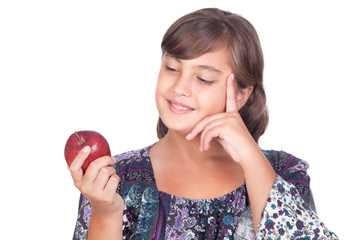 Wall Mural - Adorable preteen girl with a apple thinking