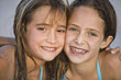© Kikor/Blend Images - Close up of smiling Hispanic girls