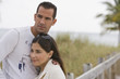 © Kikor/Blend Images - Hispanic couple hugging near ocean
