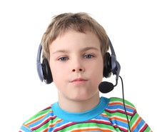 Portrait Of Little Boy With Headphones And Microphone