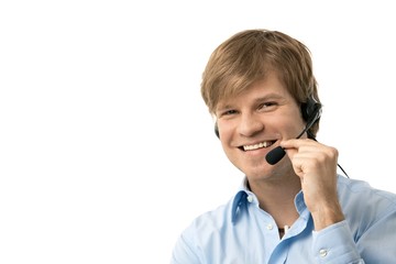 Wall Mural - Happy young man talking on headset