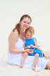 © BlueOrange Studio - Young mother and her daughter at beach