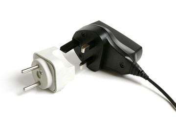 Black power plug UK type with European adapter