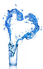 Wall Mural - water splash in shape of heart in glass