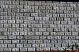 Fototapeta Kamienie - Каменная стена здания