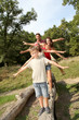 © goodluz - Family having fun on hiking day