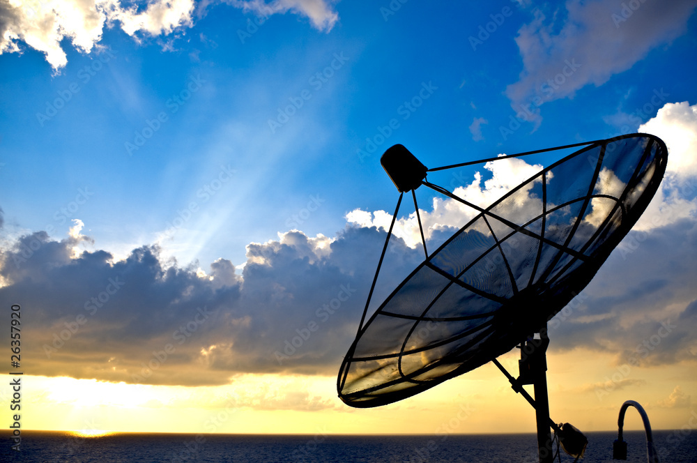 satellite dish silhoette on sunset background - obrazy, fototapety, plakaty 